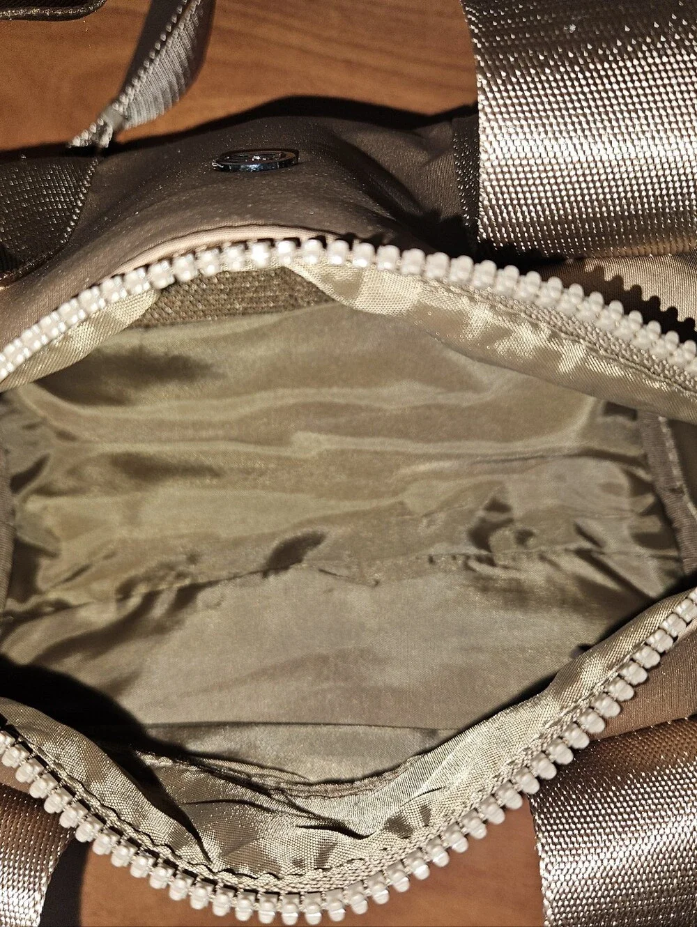 Tan Tiny Iris Duffle Bag with Adjustable crossbody Strap